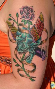 Winged skull tattoo – Tim