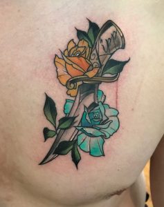 Knife flowers tattoo – Tim